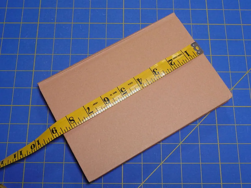 A tape measure on a book